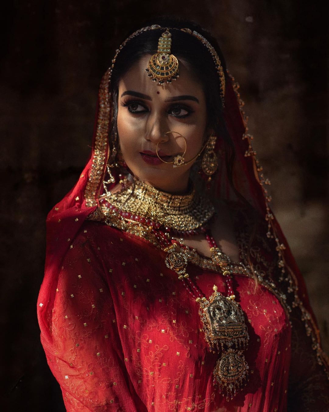 Photoshoot of Indian Model Riya Viswanathan in red Lehenga