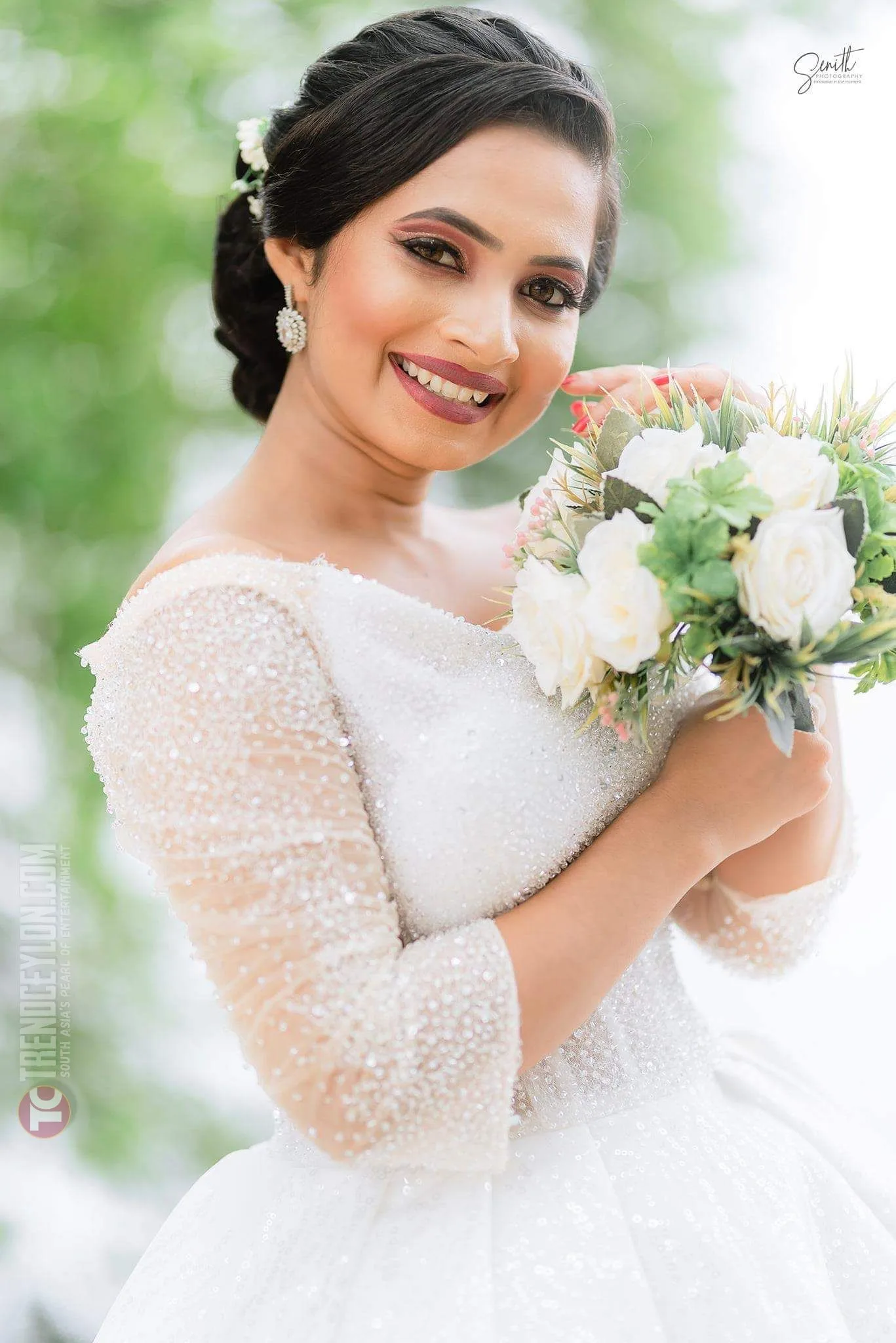 Actress Vinu Perera looks stunning in a white bridal gown