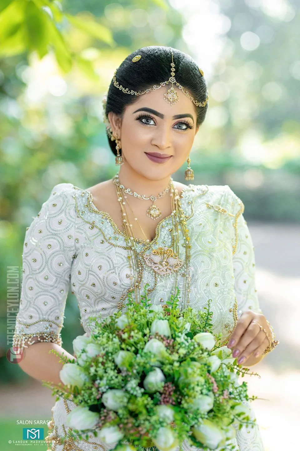 Beautiful Model Himashi Athapaththu in white bridal Saree