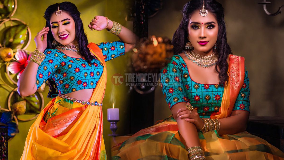Television actress Sreenithi looks beautiful in a traditional half saree