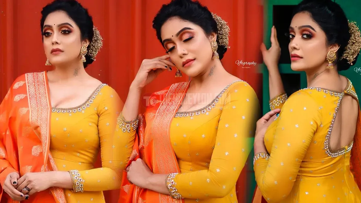Actress Abhirami Venkatachalam hot stills in yellow salwar