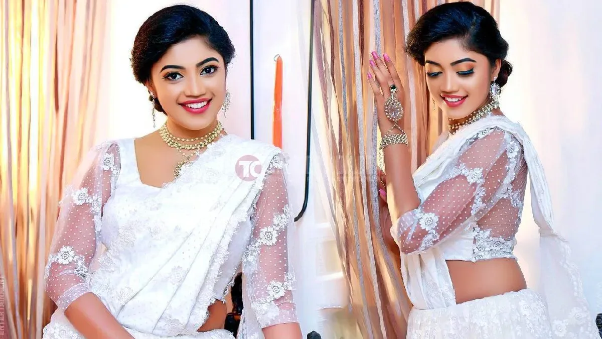 Sri Lankan Actress Hirushi Wasundara looks beautiful in a white saree