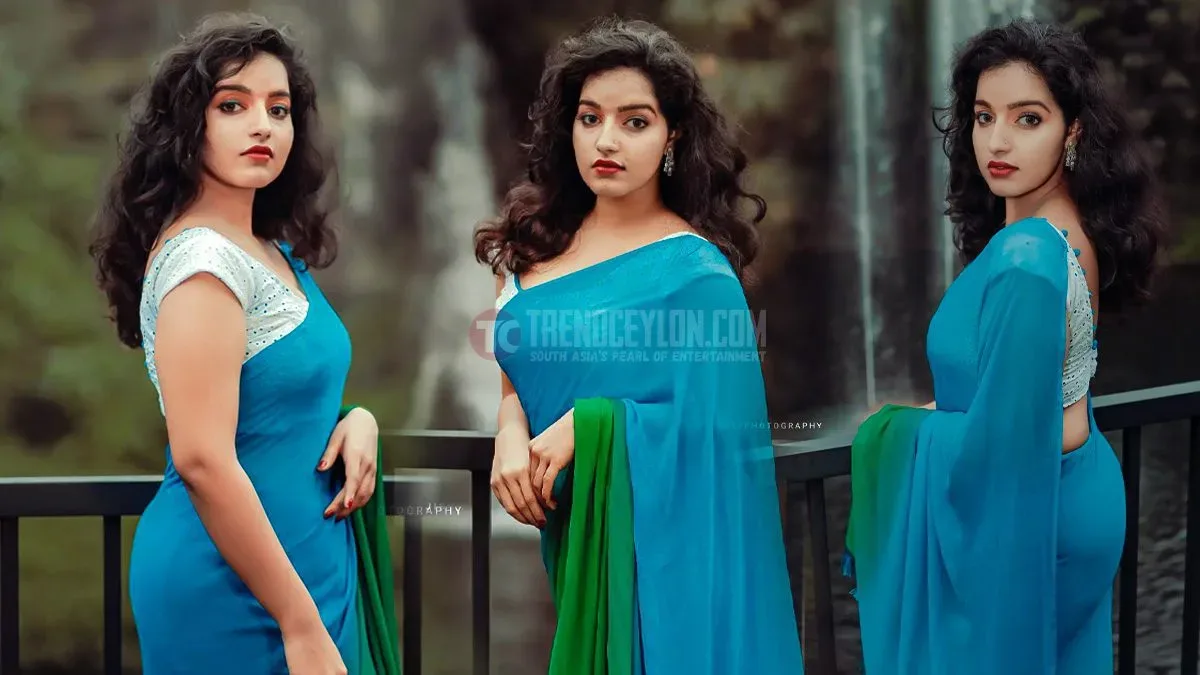 Malayam Actress Malavika Menon looks sizzling in transparent saree